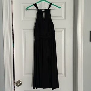Whit house black market dress. All black with halter style top and zipper back.